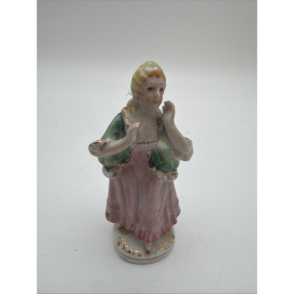 vintage hand-painted porcelain colonial or Victorian lady figurine